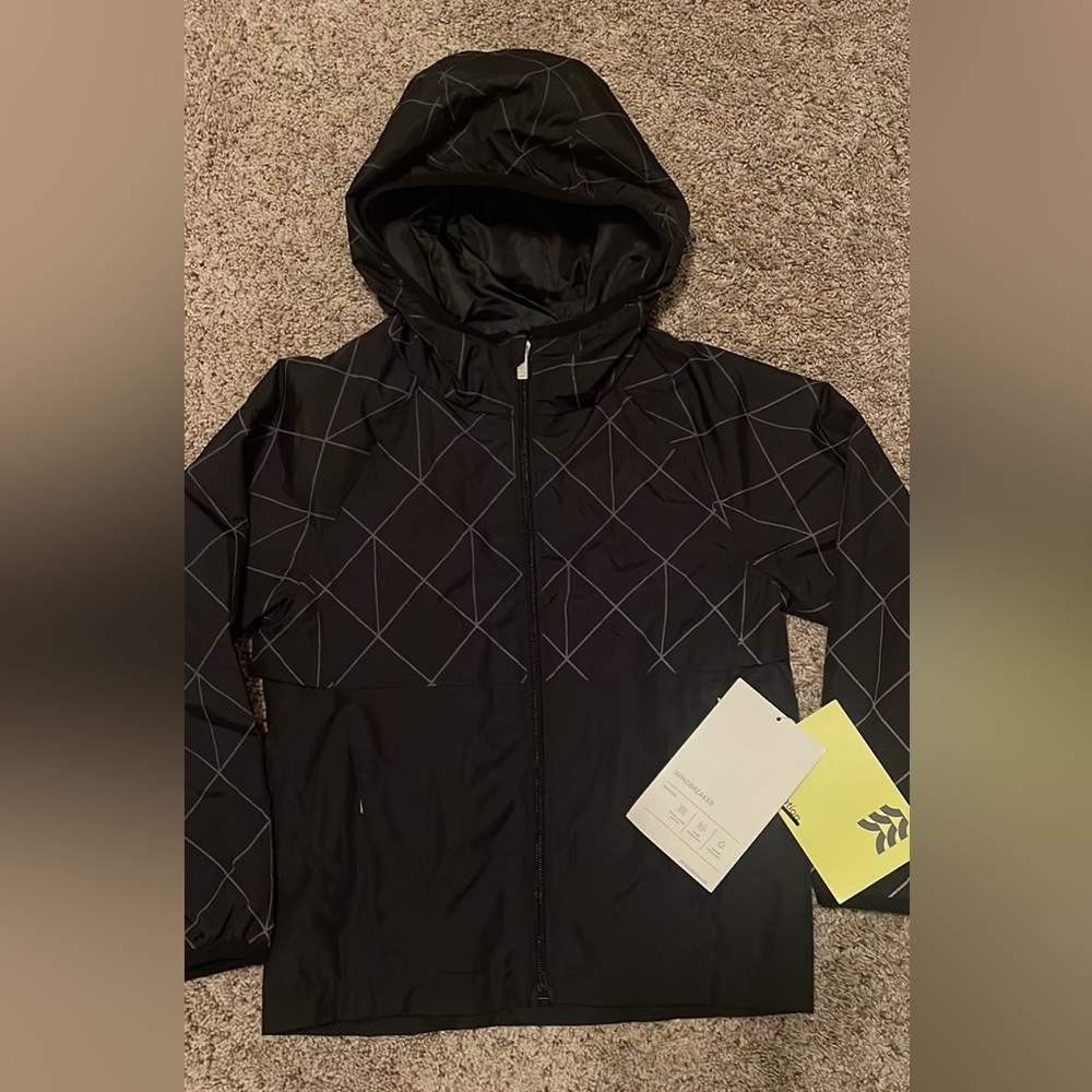 All in motion 
Kids size XS(4/5) windbreaker 
New with tag